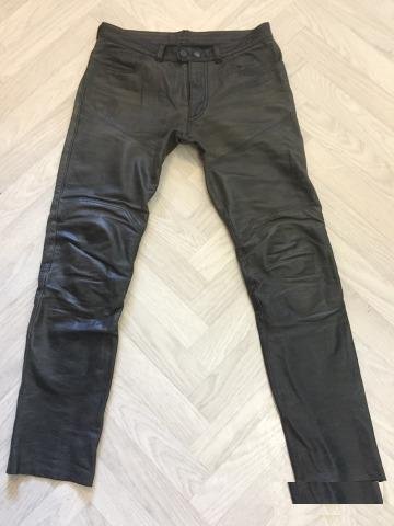 Кожаные мотоджинсы Dainese